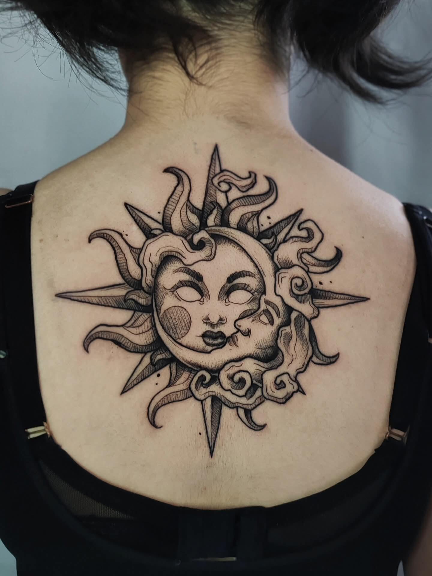 Blackwork Illustrative style sun and moon backpiece tattoo
